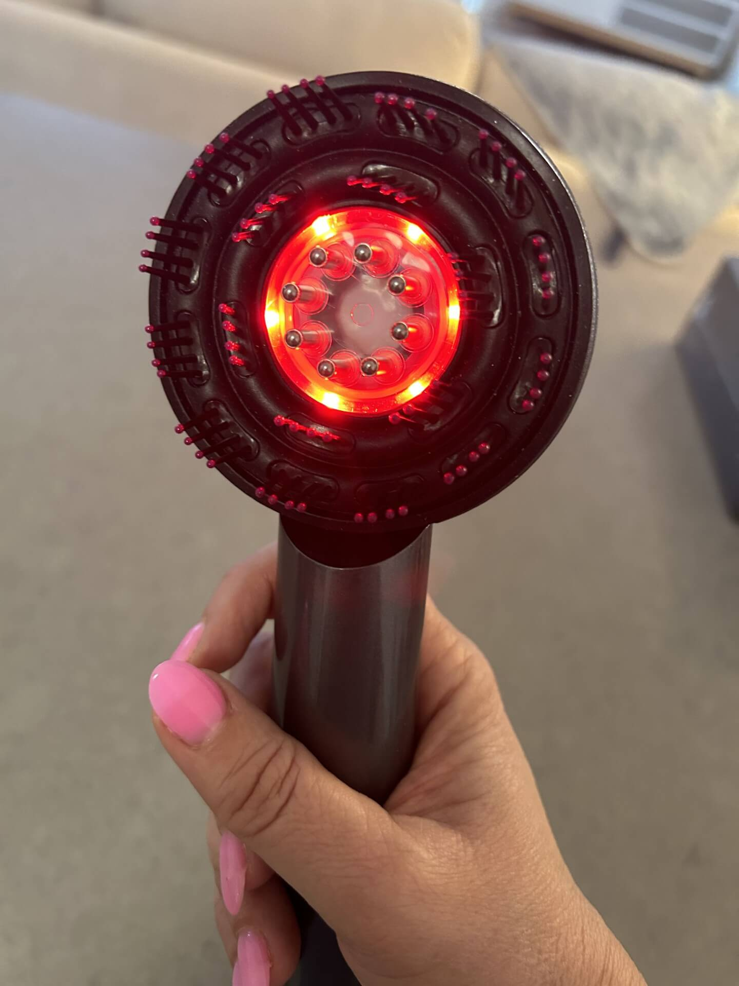 Vibrating hairbrush with scalp care oil