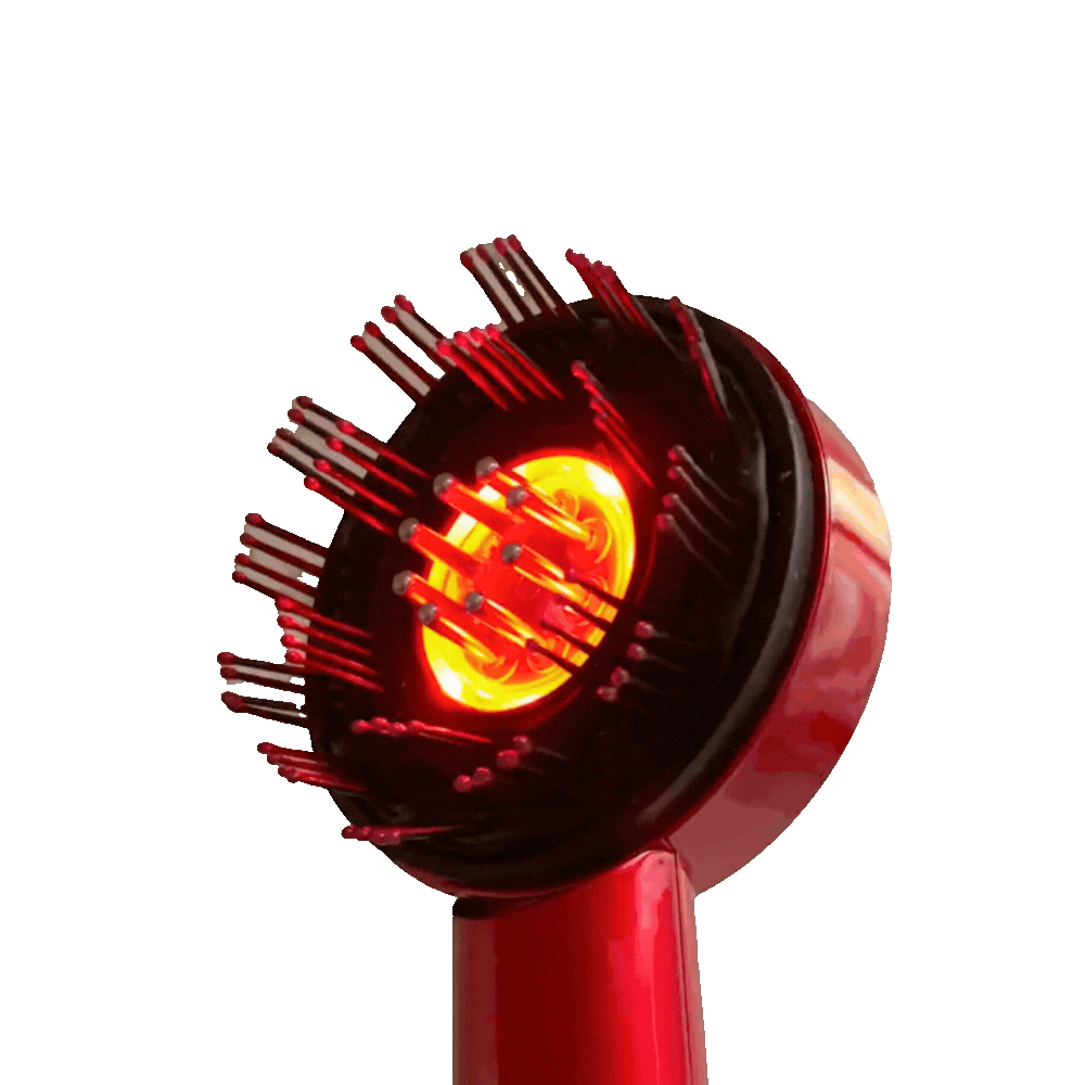 Vibrating hairbrush with scalp care oil
