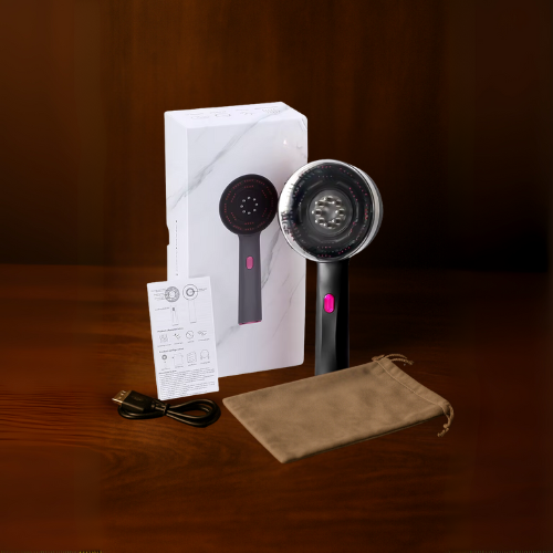Vibrating hairbrush with scalp care oil