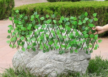 Erweiterbarer Gartenzaun aus Holz